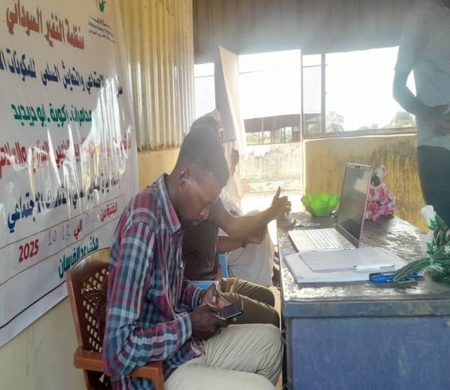 A facilitator opening a community meeting