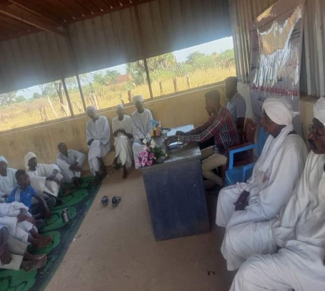 Participants seated at a community consultation